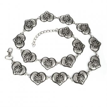 Silver metal belt with heart and edelweiss flower designs on a white background
