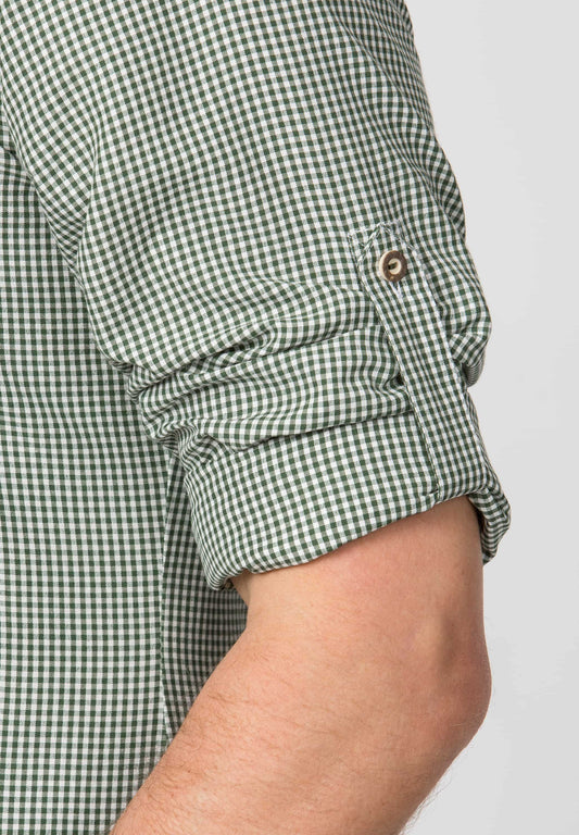 Green and white checkered shirt with rolled-up sleeves on a plain background