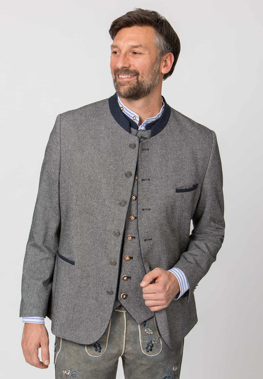 Man wearing a traditional gray jacket with buttons on a plain background