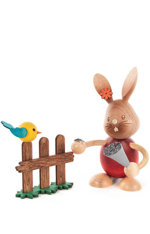 Bunny Feeding Bird